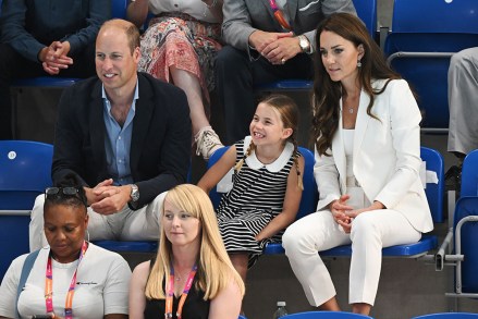Prince William, Duchess Catherine of Cambridge and Princess Charlotte watch the 2022 Commonwealth Swimming Games, day six, Birmingham, UK - 2 August 2022